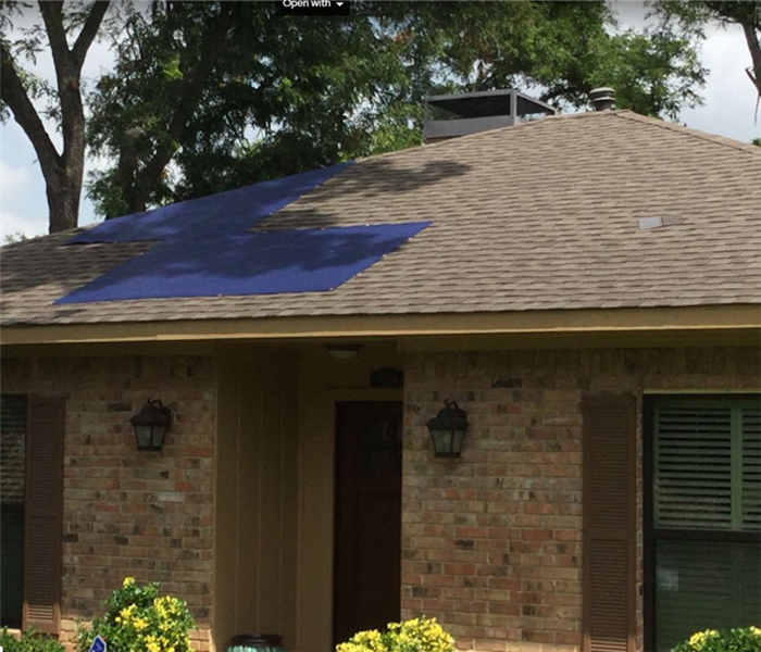 roof repair on damaged home